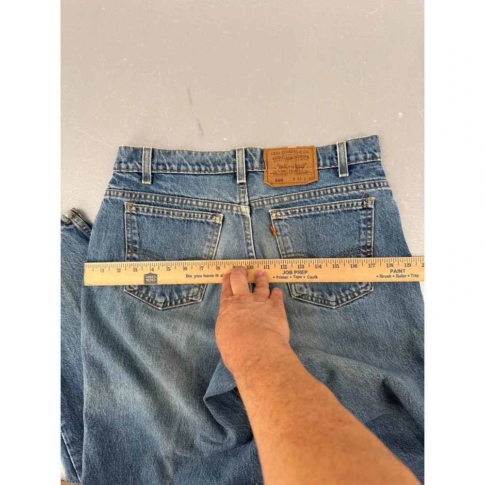 VTG Levis 560 Loose Fit Tapered Leg Orange Tab Jeans Blue Mens 33x30 USA Made